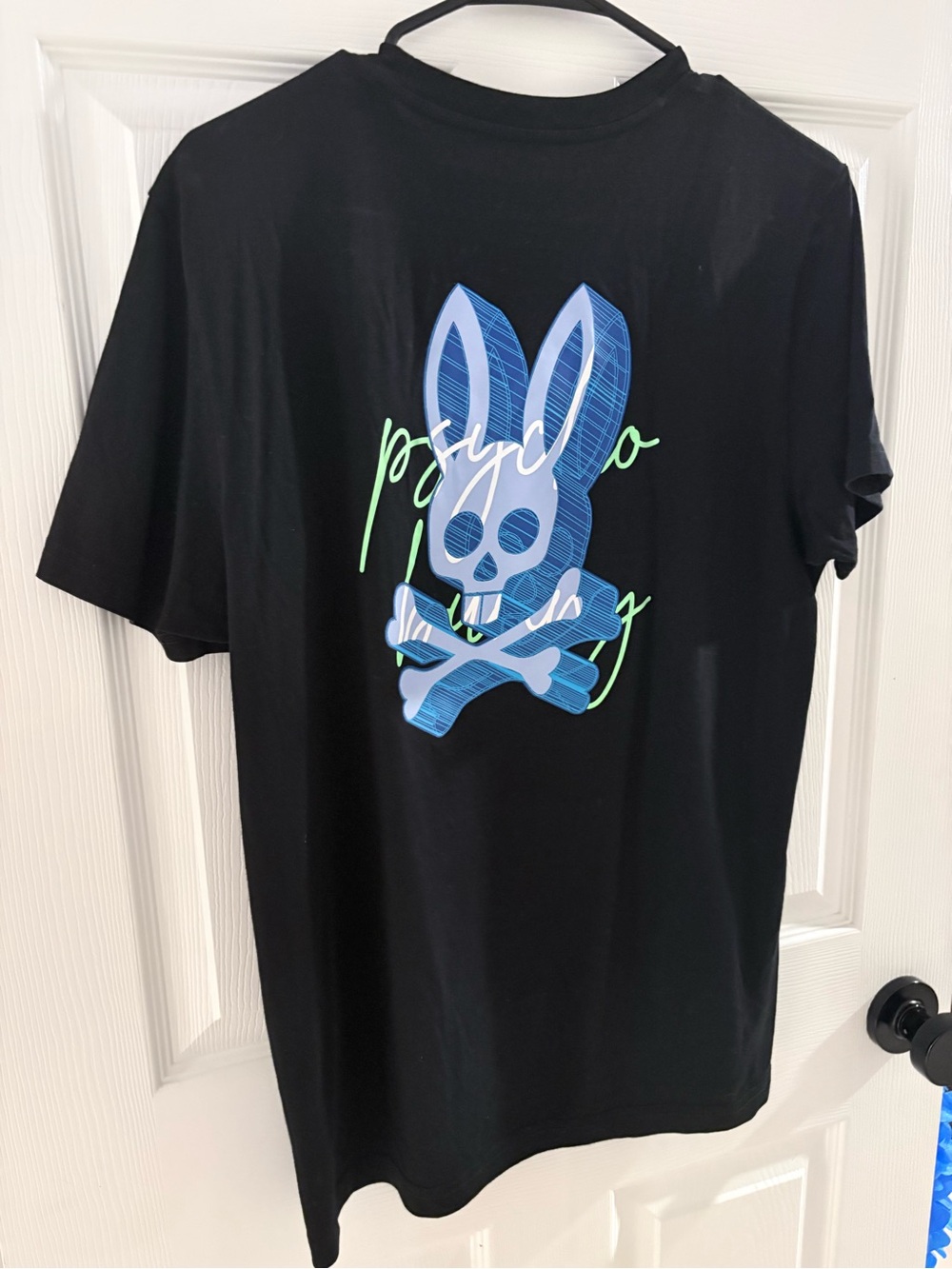Psycho bunny $20 size 4 Black Graphic Tee with Blue Bunny Skull and Neon Script